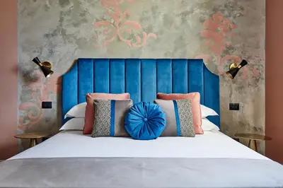 Letto o letti in una camera di Santarosa Rooms