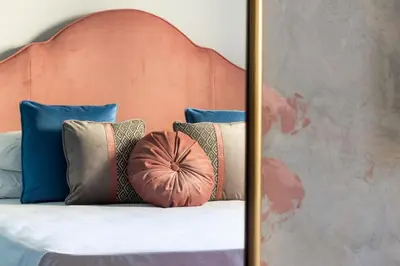 Letto o letti in una camera di Santarosa Rooms