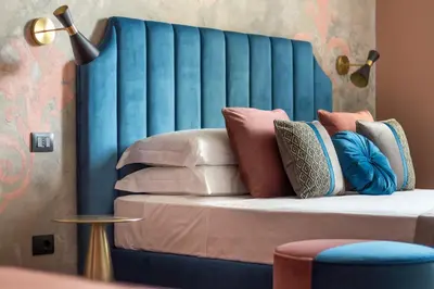Letto o letti in una camera di Santarosa Rooms