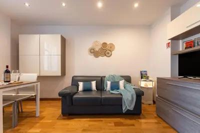 Area soggiorno di Keys of Italy - PorteNuove 18 - PN1 - Train station, one bedroom flat 2 to 4 guests