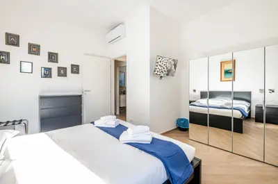 Letto o letti in una camera di GuestHost - Charming Hideaway in Florence - Apt x4