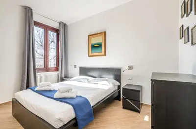 Letto o letti in una camera di GuestHost - Charming Hideaway in Florence - Apt x4