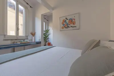 Letto o letti in una camera di Parione Apartment