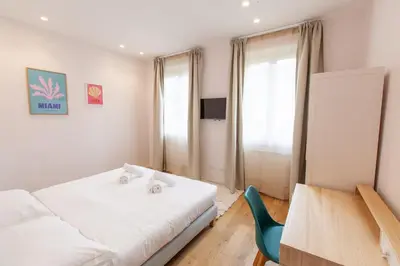 Letto o letti in una camera di Santa Maria Novella Apartment