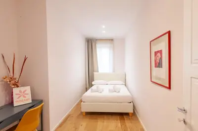 Letto o letti in una camera di Santa Maria Novella Apartment