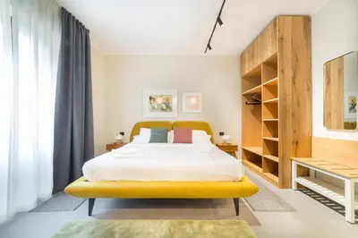 Letto o letti in una camera di Aurora apartments Piazzetta