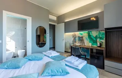 Letto o letti in una camera di 3 Bedroom Cozy Apartment In Scandicci