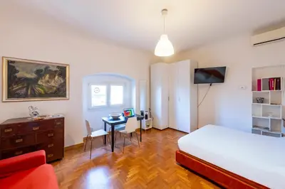Letto o letti in una camera di De' Servi Studio al Duomo - Charming Italy Tour