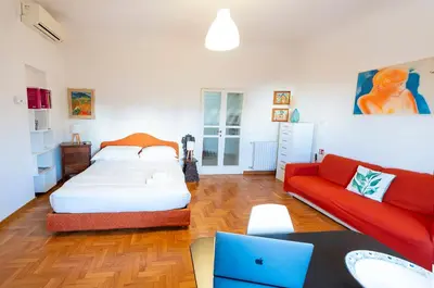 Letto o letti in una camera di De' Servi Studio al Duomo - Charming Italy Tour