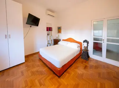 Letto o letti in una camera di De' Servi Studio al Duomo - Charming Italy Tour