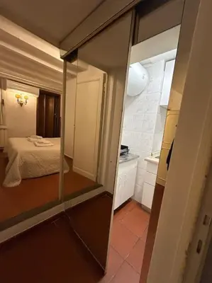 Letto o letti in una camera di Riverside Retreat by FlorenceHospitality com