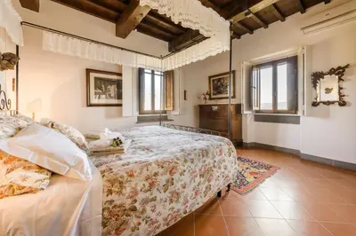 Letto o letti in una camera di Villa Fortini by Mmega