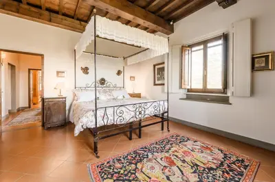 Letto o letti in una camera di Villa Fortini by Mmega