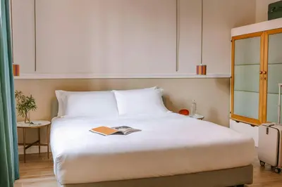 Letto o letti in una camera di Bob W Florence Santa Croce