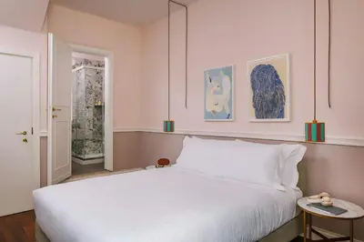 Letto o letti in una camera di Bob W Florence Santa Croce