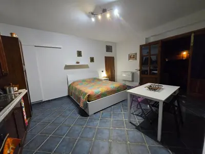 Letto o letti in una camera di Tuscany Dream - Appartamento Firenze aria condizionata e giardino