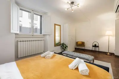 Letto o letti in una camera di Central Florence Charm - Walk to All Sights by LikeHomeFlorence