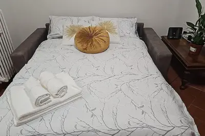 Letto o letti in una camera di [Firenze] New and Elegant Suite