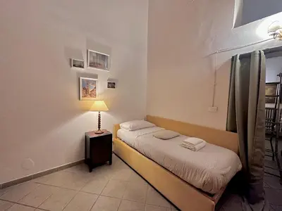 Letto o letti in una camera di Residenza Dante, Firenze