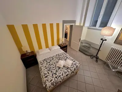 Letto o letti in una camera di Residenza Dante, Firenze