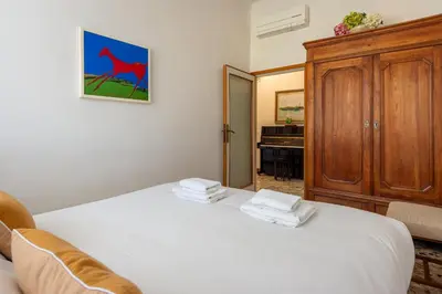 Letto o letti in una camera di La Farina Sweet Home