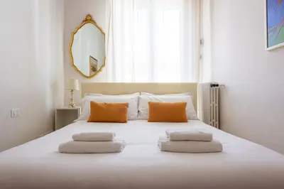 Letto o letti in una camera di La Farina Sweet Home