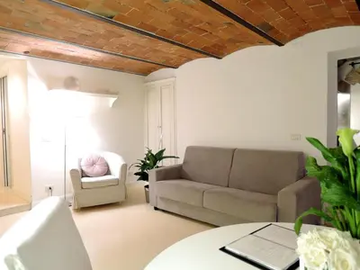 Area soggiorno di Cozy & Charming Florentine Hideaway