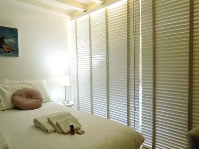 Letto o letti in una camera di Cozy & Charming Florentine Hideaway