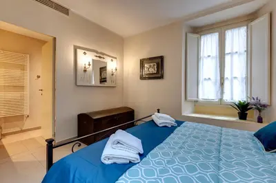 Letto o letti in una camera di Golden House