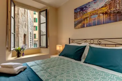 Letto o letti in una camera di Golden House