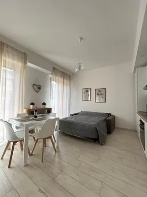Letto o letti in una camera di Dante Apartment by FlorenceHospitality com