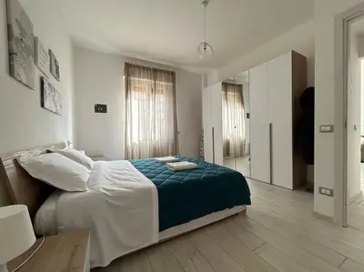 Letto o letti in una camera di Dante Apartment by FlorenceHospitality com