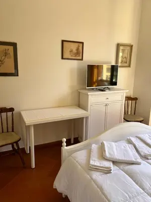 Letto o letti in una camera di Borgo San Jacopo 8