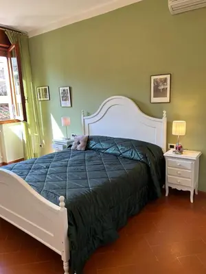 Letto o letti in una camera di Borgo San Jacopo 8