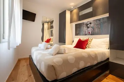 Letto o letti in una camera di Keys of Italy - GuantoBilo 15 - Unexpensive 1 bedroom flat by the Uffizi