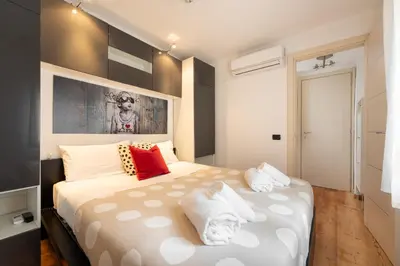 Letto o letti in una camera di Keys of Italy - GuantoBilo 15 - Unexpensive 1 bedroom flat by the Uffizi