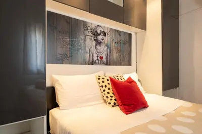 Letto o letti in una camera di Keys of Italy - GuantoBilo 15 - Unexpensive 1 bedroom flat by the Uffizi
