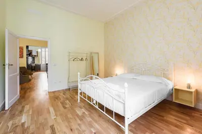 Letto o letti in una camera di Fabbroni 3 bedrooms by Mmega