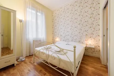 Letto o letti in una camera di Fabbroni 3 bedrooms by Mmega