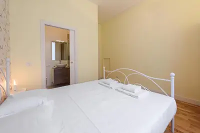 Letto o letti in una camera di Fabbroni 3 bedrooms by Mmega