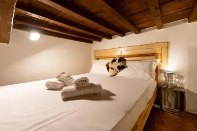 Letto o letti in una camera di Keys of Italy - Pilastri 24 - City center studio perfect for couples