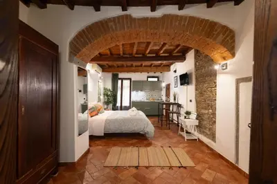 Letto o letti in una camera di Keys of Italy - San Frediano 38 - Monolocale silenzioso in Oltrarno
