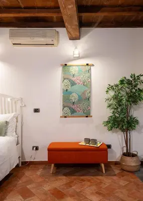 Letto o letti in una camera di Keys of Italy - San Frediano 38 - Monolocale silenzioso in Oltrarno
