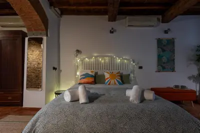 Letto o letti in una camera di Keys of Italy - San Frediano 38 - Monolocale silenzioso in Oltrarno