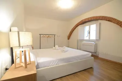 Letto o letti in una camera di Keys of Italy - Sprone 15 - 2 bedroom family apartment by Ponte Vecchio