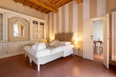 Letto o letti in una camera di Keys of Italy - Ghib 80 Big e Room - 2 apt in via Ghibellina