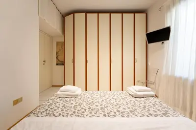 Letto o letti in una camera di Keys of Italy - Ghib 80 Big e Room - 2 apt in via Ghibellina