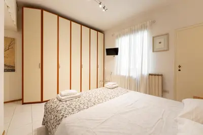Letto o letti in una camera di Keys of Italy - Ghib 80 Big e Room - 2 apt in via Ghibellina