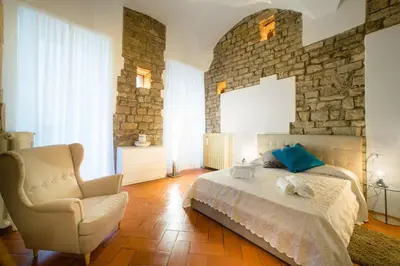 Letto o letti in una camera di Keys of Italy - Borgo SSApo 13 - Deluxe 2 Family Apts by Ponte Vecchio