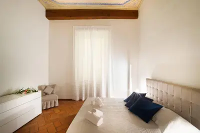 Letto o letti in una camera di Keys of Italy - Borgo SSApo 13 - Deluxe 2 Family Apts by Ponte Vecchio
